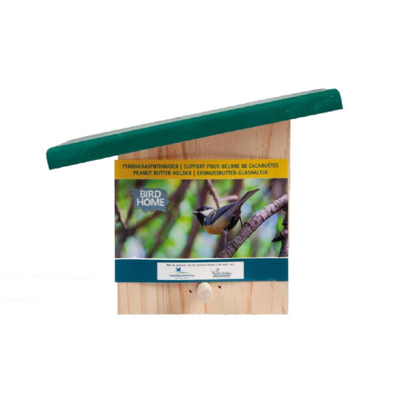 A simple wooden birdfeeder designed to hold a peanut butter jar, with a green slanted roof for weather protection.