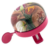 Cloche de vélo avec des tulipes roses